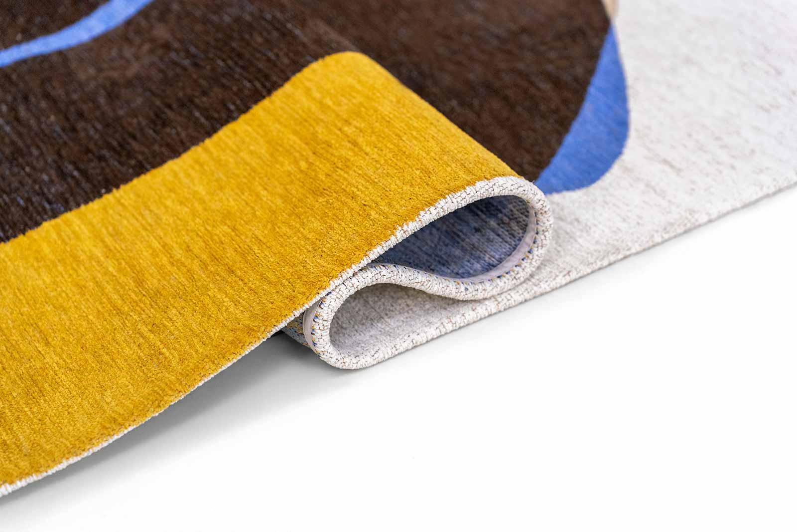 Louis De Poortere matta Gallery 2085 Stones Sunny Blue fold